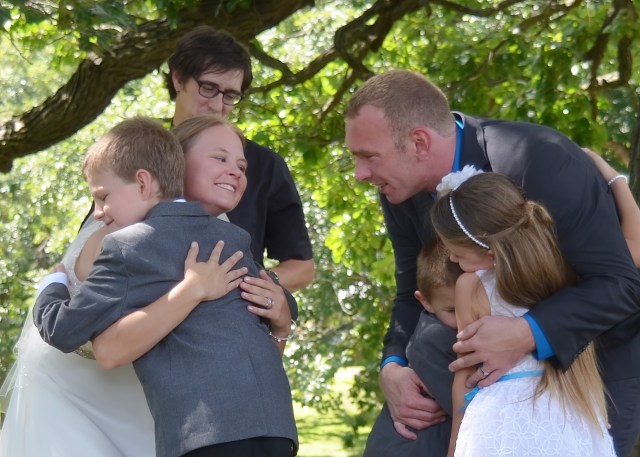 Bride, Groom and Children at Wedding by Lance Albers Photography