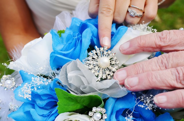 Wedding Broach Heirloom Being Passed From Grandmother to Granddaughter.