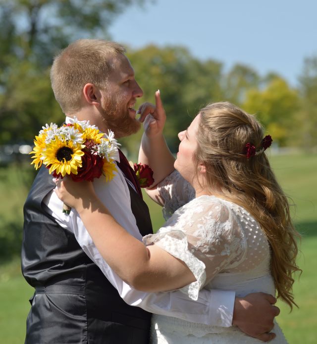 Groom and Bride Touching his Nose. Lance Albers Photography