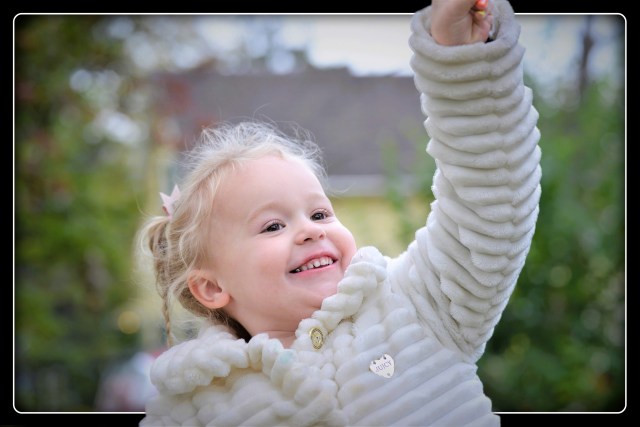 Little Girl with her New Coat (Lance Albers Photography)