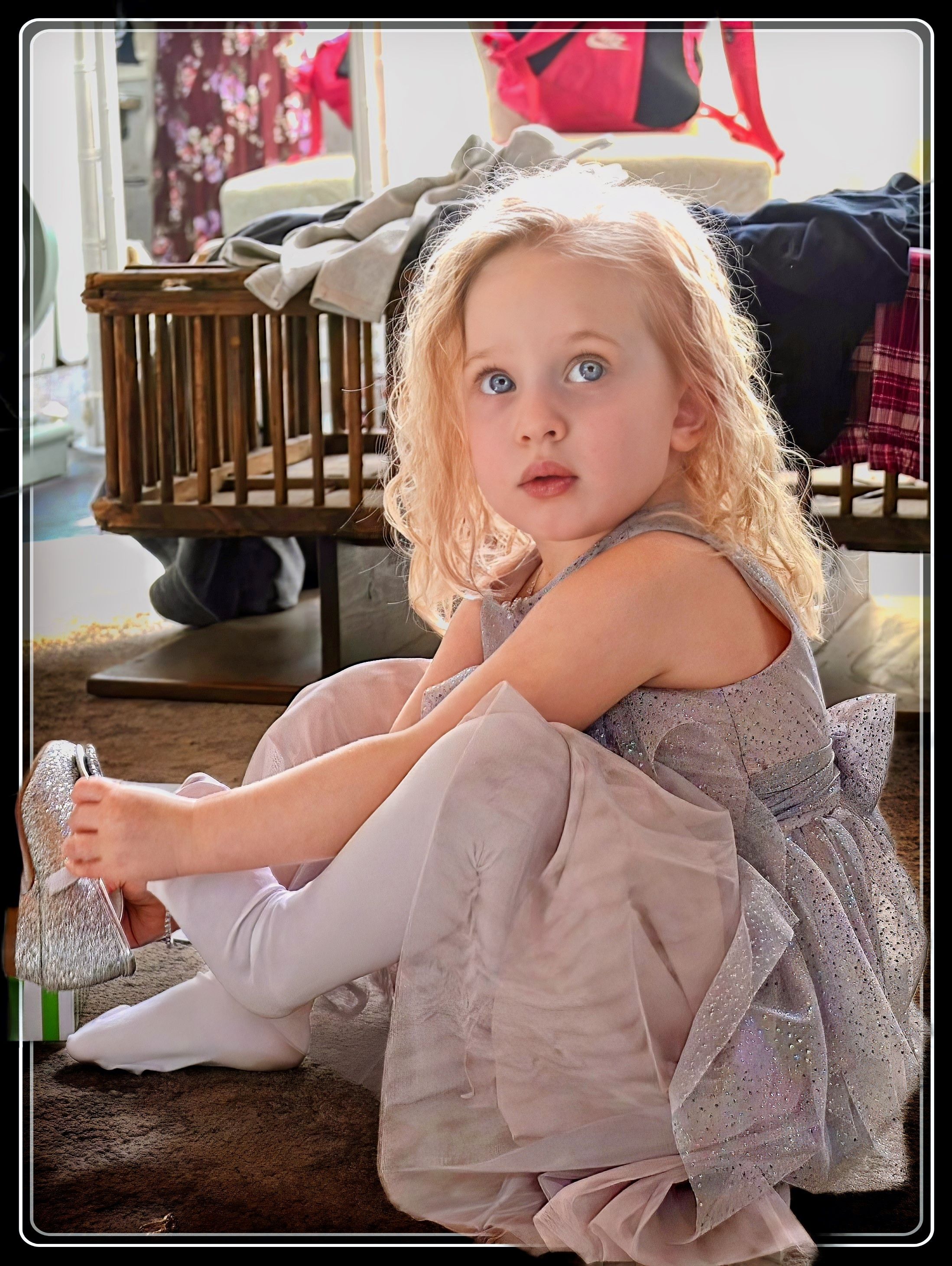 Girl putting on her wedding shoes (Lance Albers photography)