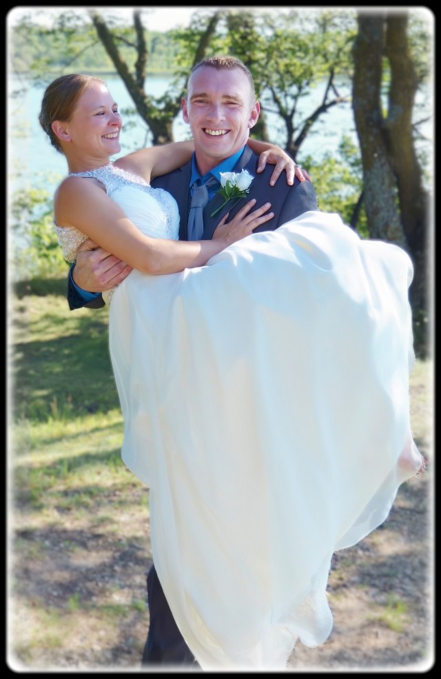 Groom Carries Bride By Lance Albers Photography