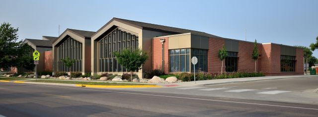 Exterior architectural photography of the modern brick and glass Fergus Falls Public Library building.