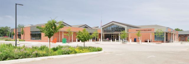 Exterior panoramic view of the Fergus Falls Public Library building.